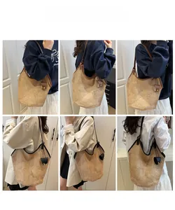 Detailed views of large woven straw tote bag with leather trim and mesh texture