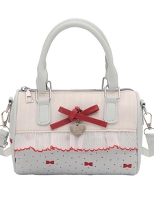 Borsa Boston dopamina con contrasto blu bianco, pois e dettaglio ciondolo cuore