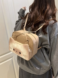 Fashionable kitten-shaped backpack in khaki leather featuring cute cat ears and face