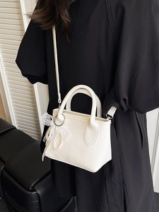 White lychee grain mini tote bag with pearl lace pendant and crossbody strap