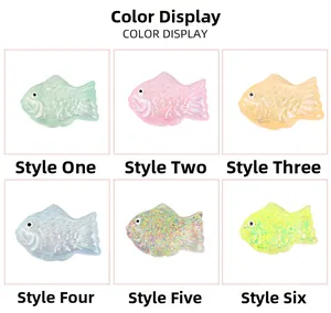 Detailed color display of cute fish-shaped squishy toys in six glitter and pastel finishes