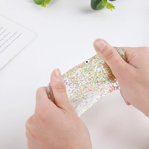 Stretchy carp squishy toy with colorful glitter and maltose filling for stress relief