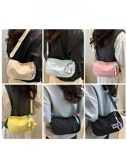 Detailed views of multi-color nylon crescent crossbody bags shown on models in six angles