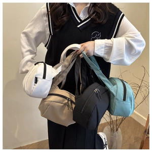 Collection of small nylon crossbody bags in white, beige, black and turquoise colors