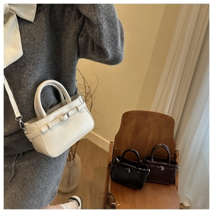 Three colors of retro handbag with textured leather finish and metal buckle strap