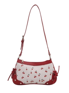 White shoulder bag with red cherry print and adjustable strap in a minimalist style