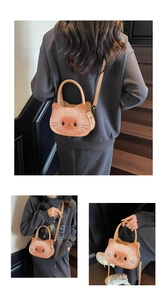 Three-way view of cat-themed toast crossbody bag with adjustable straps and handle
