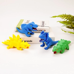 Set di quattro colorati giocattoli antistress a forma di dinosauro inclusi T-Rex e Stegosauro