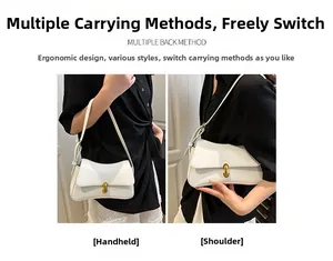 Detailed view of white flap shoulder bag featuring a gold cylindrical twist lock