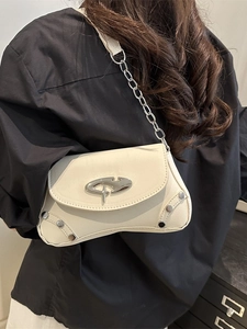 Chic off-white asymmetrical underarm bag with silver chain and hardware for women