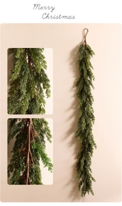 Detail of Norfolk Pine Christmas garland with realistic soft rubber needles and hanging loop