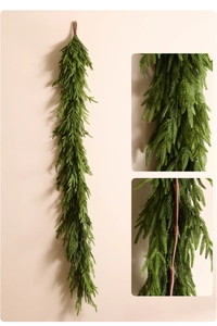 Detailed close-up of realistic Norfolk pine garland with soft needle texture and brown loop