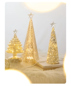 Three-piece set of champagne LED glass Christmas trees with elegant warm lighting details