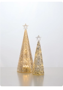 Macro shot of two glowing champagne mercury glass Christmas trees with warm LED lights
