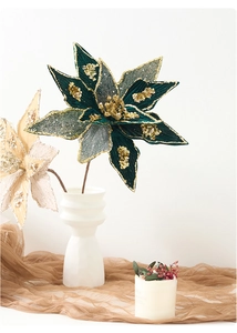 Macro shot of luxury velvet Christmas flowers with gold glitter and sequins detail