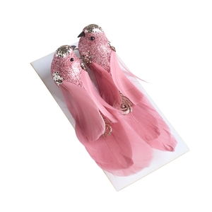 Set of two decorative pink feather birds with glitter accents for Christmas hanging ornaments