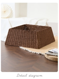 Detail view of the deep brown woven Christmas tree collar with natural rattan texture