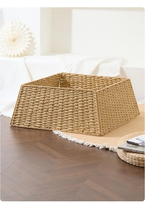 Detailed view of woven Christmas tree base basket on a rug with cozy home decor