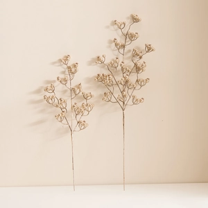 Two champagne gold berry decorative branches for festive holiday floral arrangements