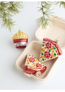 Detail of pizza and fries glass ornaments inside a takeout box for Christmas decor