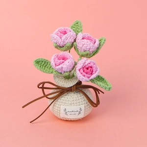 Handmade crochet pink roses in a cream vase bag with handmade with love label