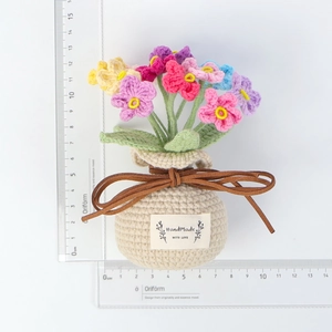 Fiori di non ti scordar di me colorati all'uncinetto in vaso, altezza circa 13 cm