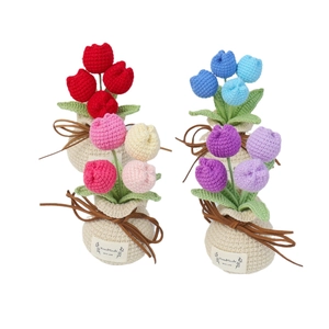 Set of four handmade crochet tulip potted plants in various colors for home decor