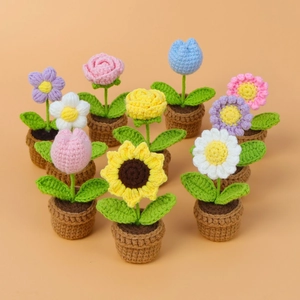 Handmade crochet sunflower and tulip potted plants in vibrant colors for desk decor