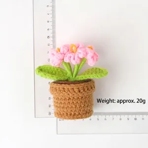 Handmade crochet pink forget-me-not flower in small pot, mini yarn desktop decor ornament