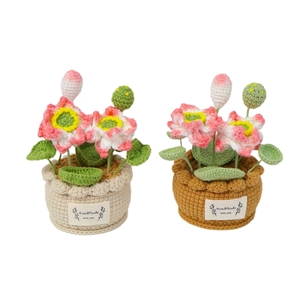 Handmade crochet lotus potted plant with pink gradient flowers and green leaves