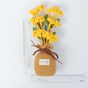 Handmade crochet yellow honeysuckle flower pot in white background with size scale
