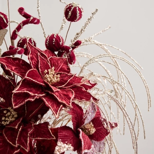 Luxurious burgundy velvet poinsettia branch with gold glitter and silver decorative twigs