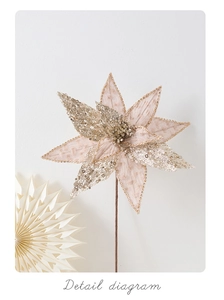 Detailed view of champagne gold velvet Christmas flower with sequins and glitter petals