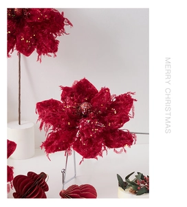 Detail of luxury burgundy artificial magnolia with gold glitter edges for Christmas decor