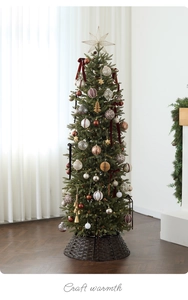 Detailed view of the decorated Christmas tree with LED lights and festive ornaments