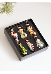 Detailed set of 6 mini colored glass Christmas tree ornaments in a black gift box display
