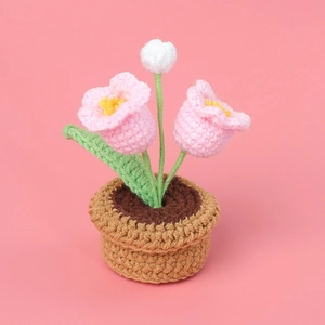 Handmade crochet pink lily of the valley potted plant with white pompom decor