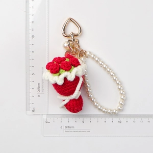 Handmade knitted red rose flower keychain bouquet with gold heart clasp and pearls