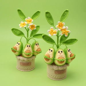 Handmade crochet avocado potted plant decor with green leaves and small white flowers