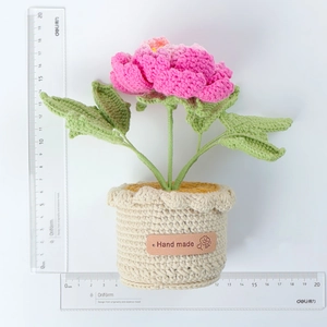 Handmade crochet pink peony flower bonsai in beige pot measuring 17cm high and 19cm wide