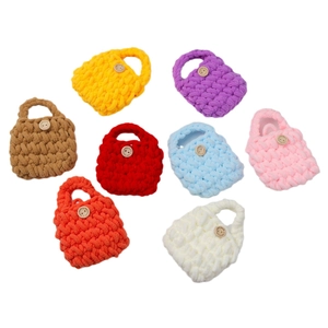 Handmade crochet yarn earphone case with wood button in eight vibrant assorted colors