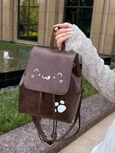 Retro dark brown cat-themed faux leather backpack with cat face and paw print designs