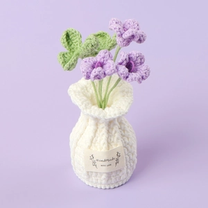 Detail of handmade purple crochet sunflower pot with HandMade WITH LOVE label