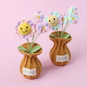 Handmade crochet sunflower potted plants in pastel colors with handmade love label