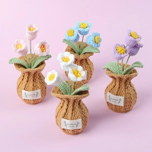 Set of four handmade crochet tulip flower pots in pink blue white and purple colors