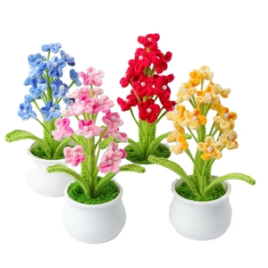 Handmade crochet mini flower pots in blue, pink, red, and yellow with pearl details