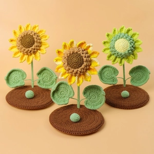 Detailed view of handmade crochet sunflower stands in yellow, orange, and green colors