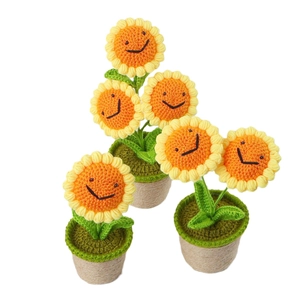 Handmade crochet sunflower potted plants with smiley faces for desktop decoration