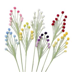 Handmade crochet yarn flower bouquet with seven colorful knitted blossoms for home decor