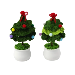 Handmade crochet Christmas tree potted ornaments with colorful pom-poms for desktop decor